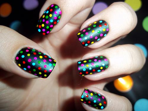 black and different colours polka dots